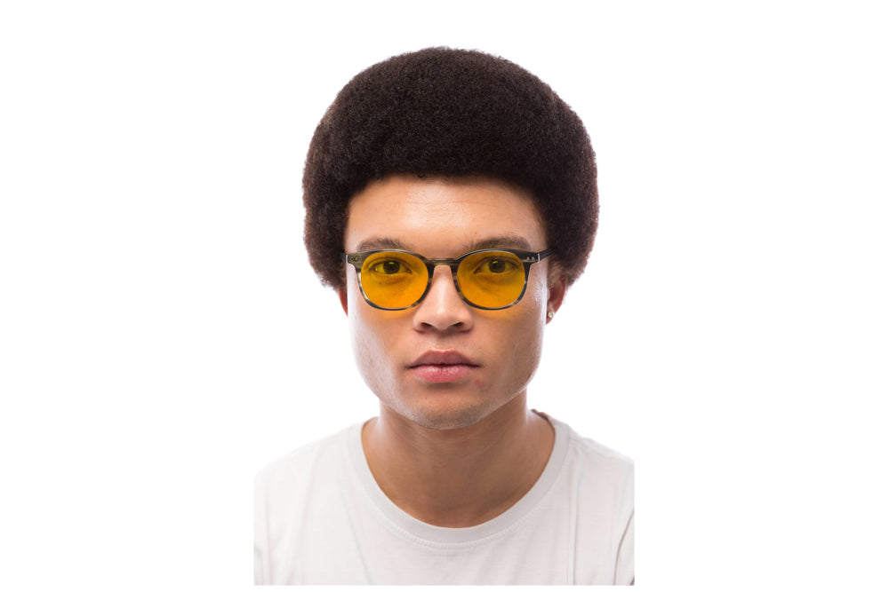 Man Wearing Arrow Light Sensitivity Glasses Readers