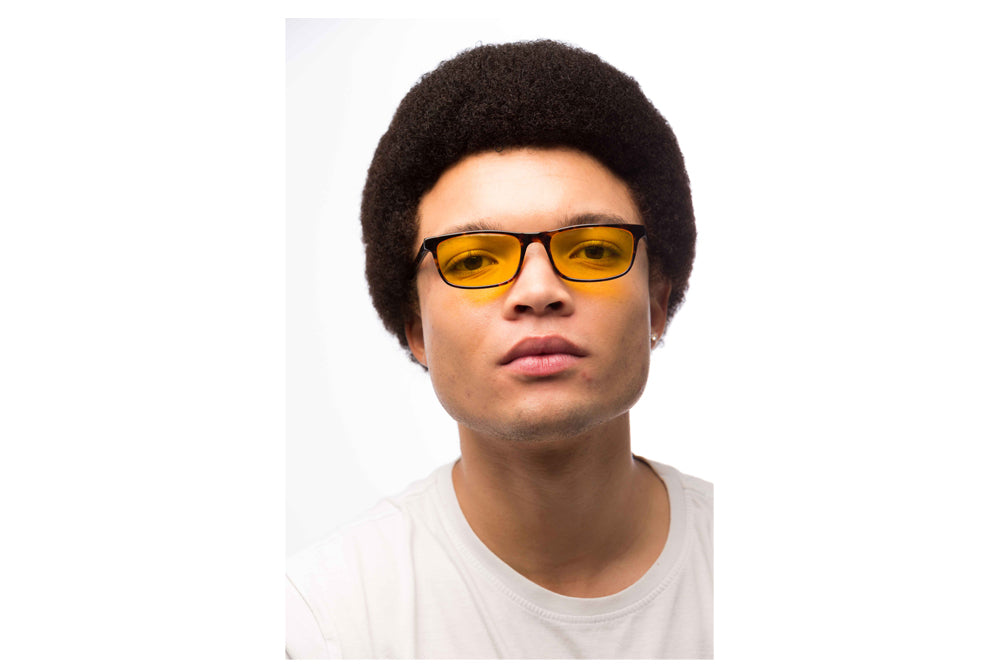 Man Wearing Tortoise Shell Light Sensitivity Glasses Prescription