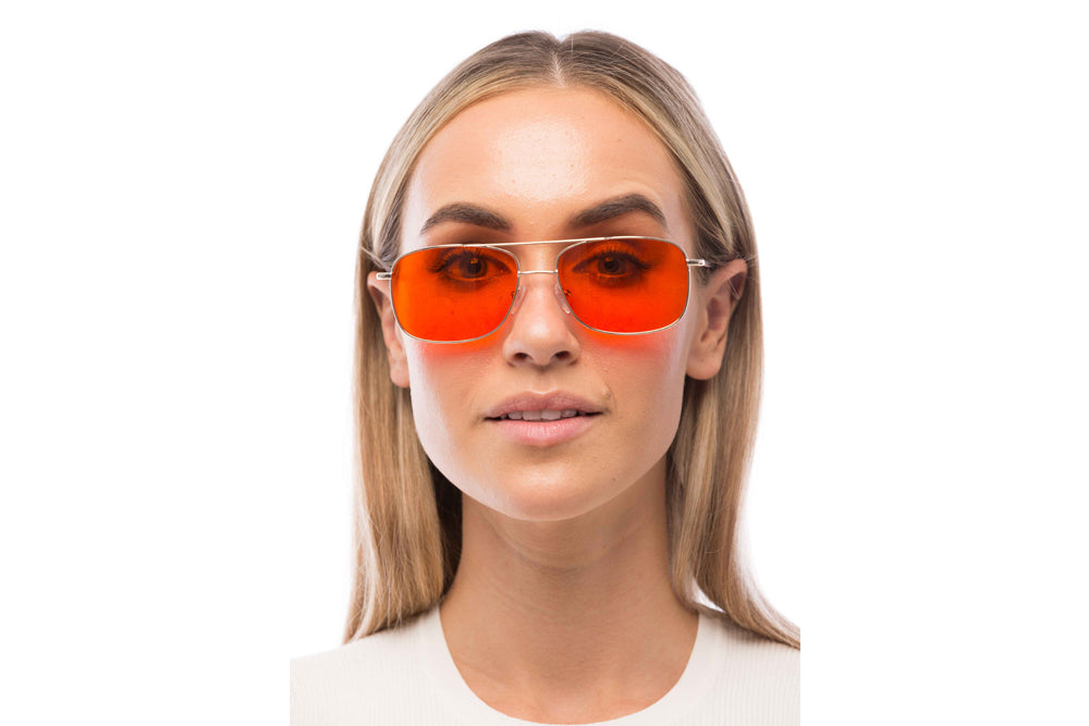 Woman Wearing Magnum Blue Light Blocking Glasses