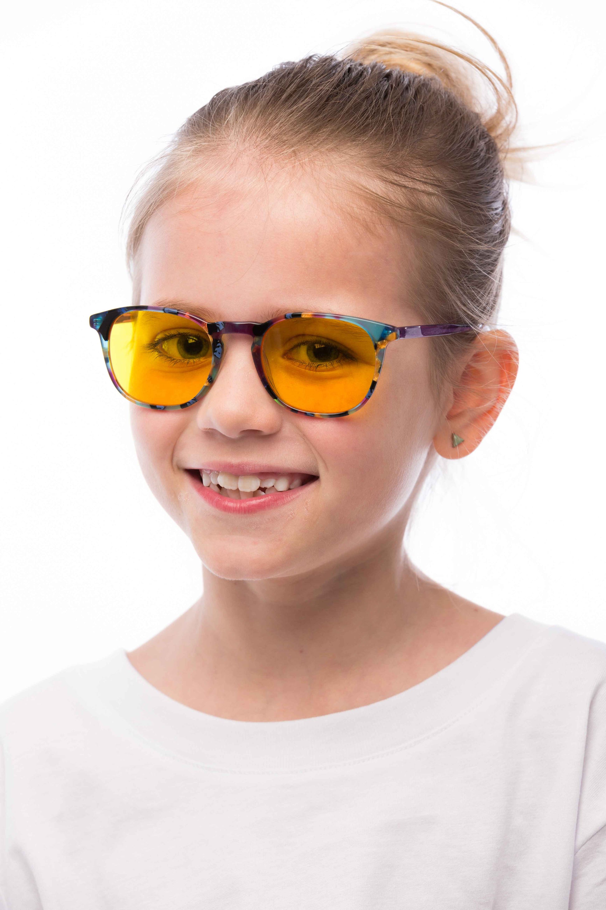 Girl Wearing Elsa Light Sensitivity Glasses, angled view