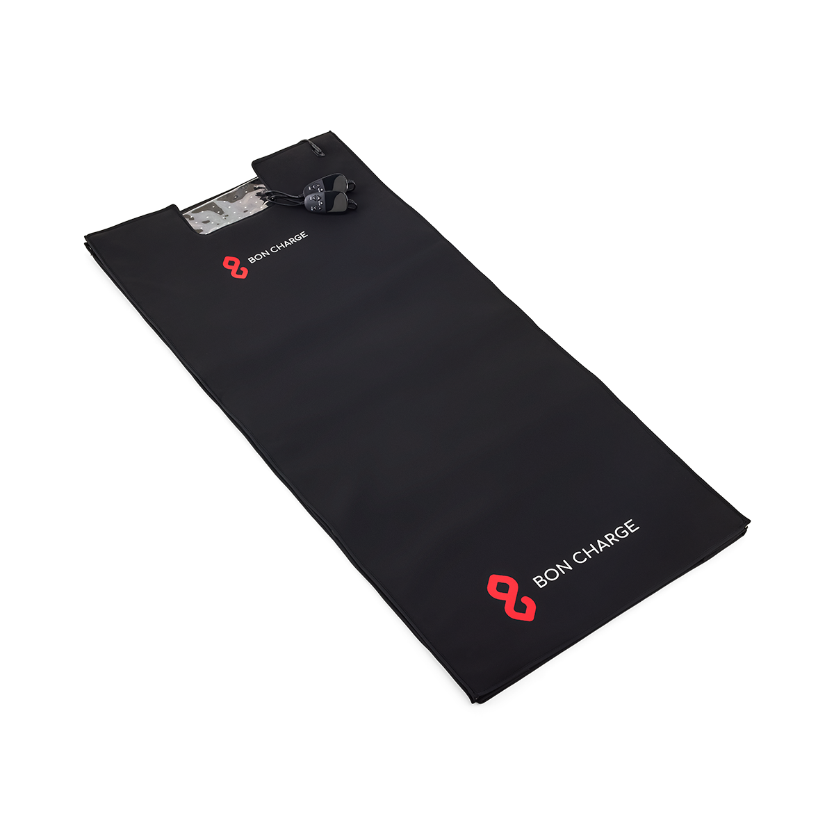The folded BON CHARGE red light blanket with its two mats and protective goggles
