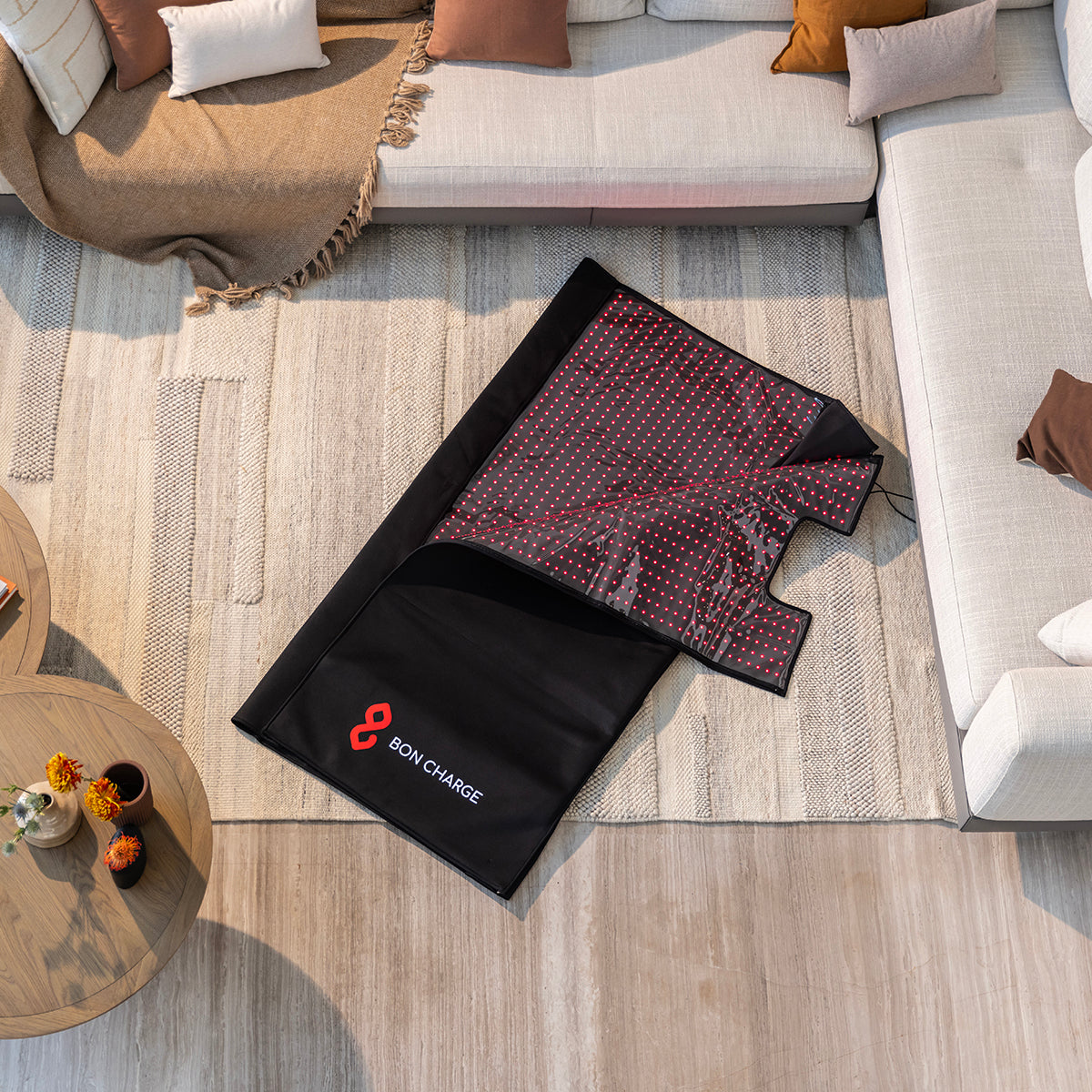 The red light blanket laid out and ready to use in a living room