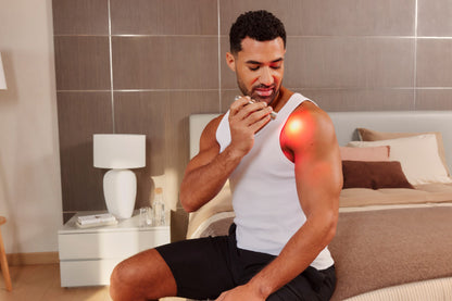 Man Using Bullet Red Light Therapy Device